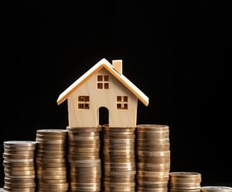 house miniature on top of one straight coins stack --ar 9:16